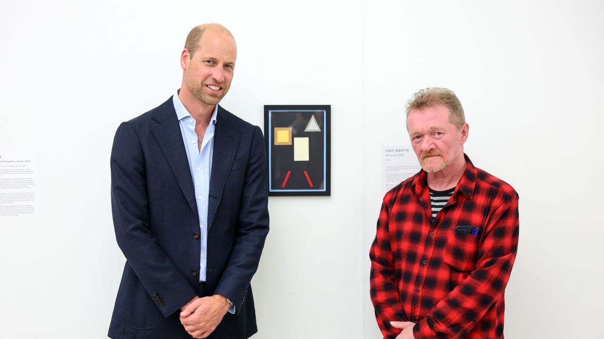 The Prince of Wales speaks with Dave Martin during a visit to the Saatchi Gallery