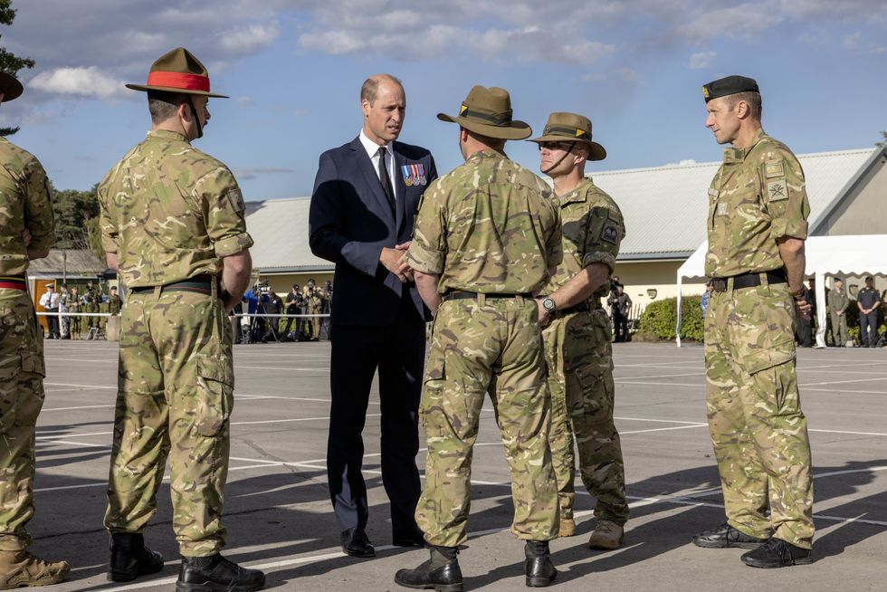 The Prince of Wales talking to members of New Zealand military as he meet troops from the Commonwealth, who have been deployed to the UK to take part in the funeral of Queen Elizabeth II, during a visit to the Army Training Centre (ATC) Pirbright in Guildford. Soldiers from Canada, Australia and New Zealand have gathered at Pirbright to rehearse their roles in the funeral on Monday. Picture date: Friday September 16, 2022.