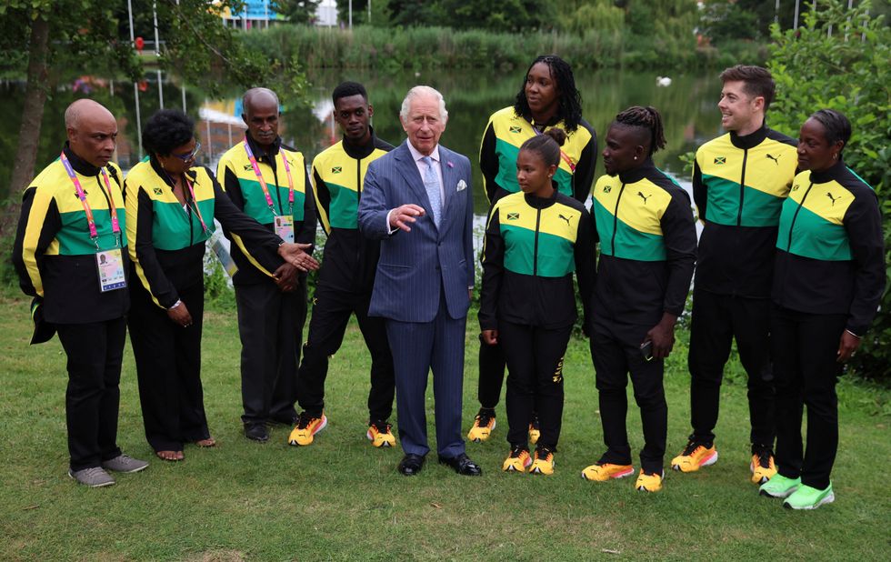 The Prince of Wales with athletes and members of the team Jamaica during a visit to the Athletes Village at the University of Birmingham at the Birmingham 2022 Commonwealth Games. Picture date: Thursday July 28, 2022.