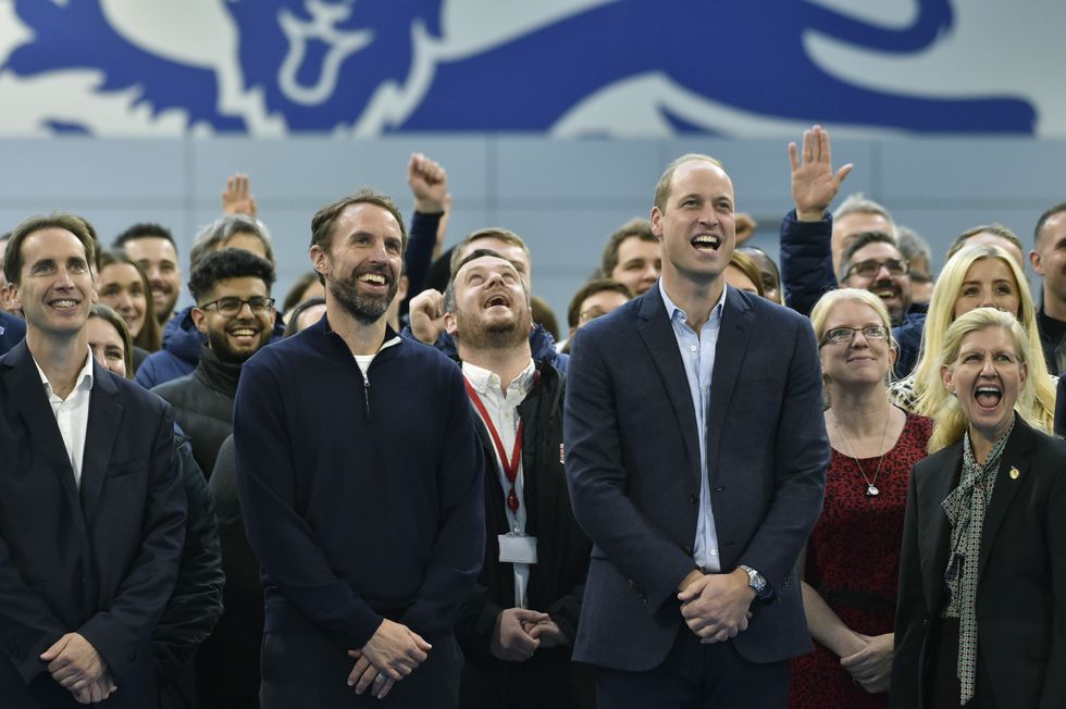 The Prince of Wales with England soccer coach Gareth Southgate (second left) during a visit to St. George's Park in Burton upon Trent to mark its 10th anniversary as the home of English football. Picture date: Wednesday October 5, 2022.