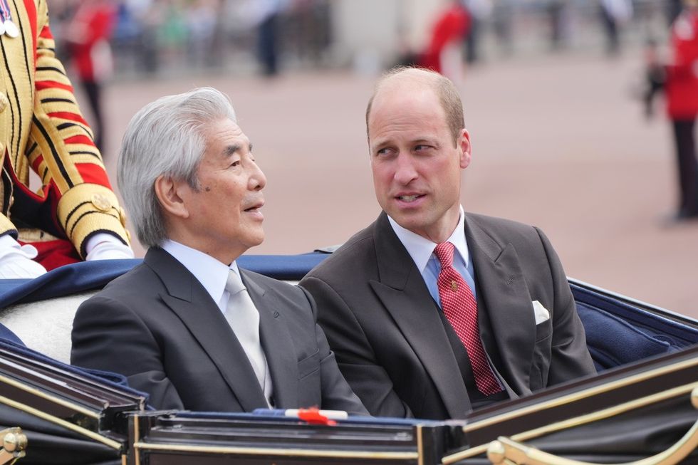 The Prince of Wales with Hirofumi Nakasone, the Japan party's head of the official suite arriving at Buckingham Palace