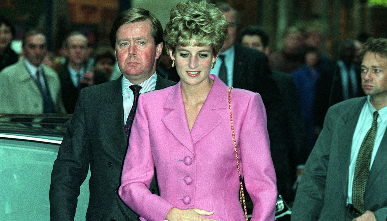 The Princess of Wales arrives at an Aids Information kiosk in the Latin quarter of Paris with her bodyguard Inspector Ken Wharfe during a day of engagements in the French capital.