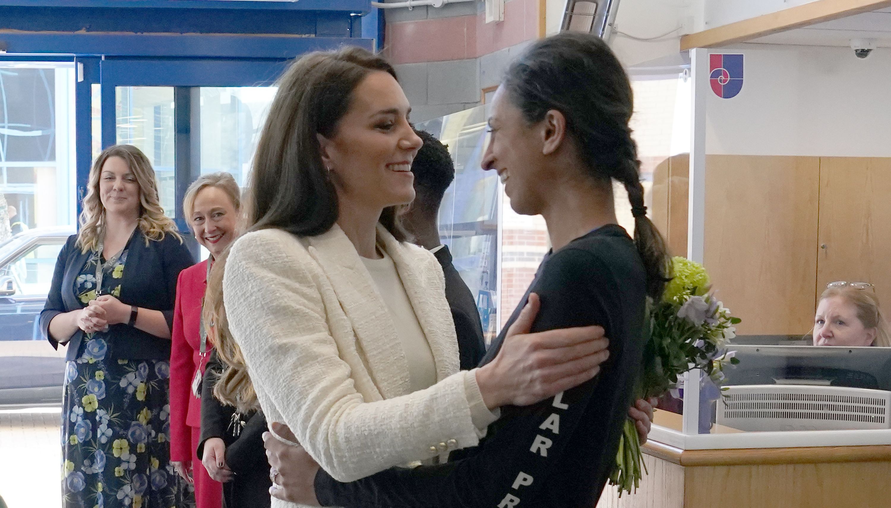 The Princess of Wales (left) greets Captain Preet Chandi, during a visit to Landau Forte College, in Derby, to celebrate Captain Chandi's return from her solo expedition across Antarctica. Picture date: Wednesday February 8, 2023.
