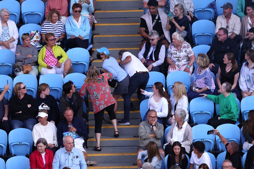 The protestor was dragged out the arena by other crowd members