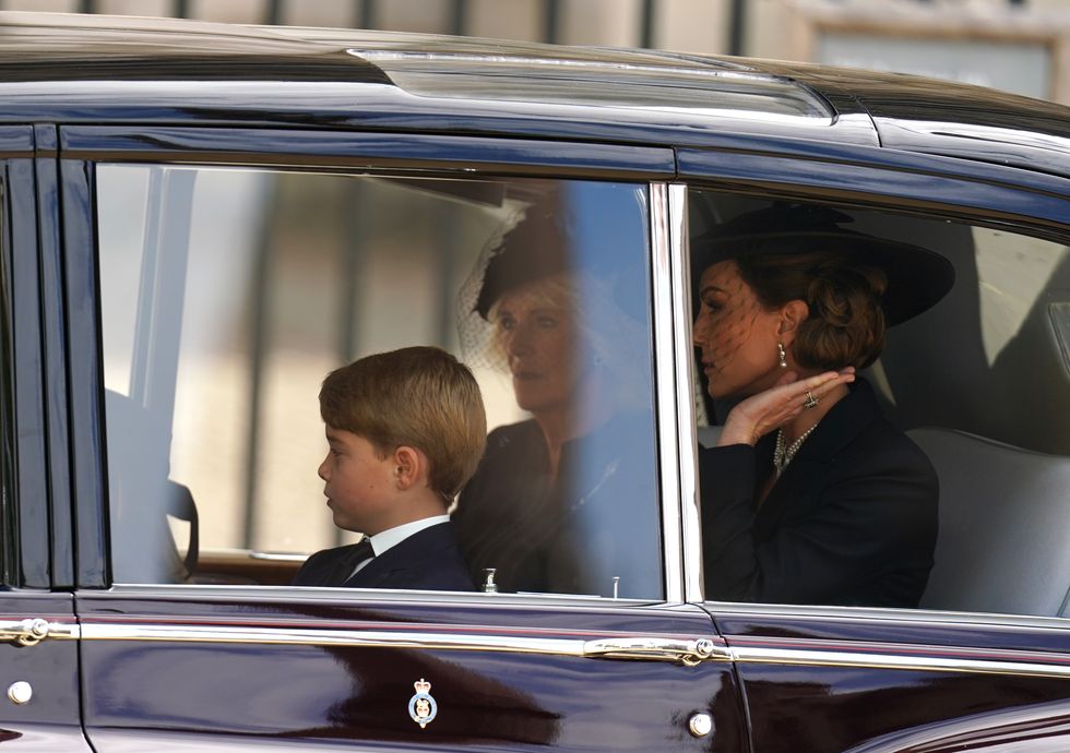 The Queen Consort, Prince George and the Princess of Wales leave in a car following the State Funeral of Queen Elizabeth II, held at Westminster Abbey, London. Picture date: Monday September 19, 2022.