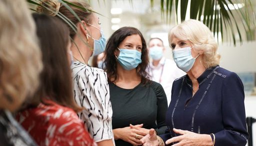 The Queen Consort (right) meets members of staff and independent domestic violence advisers in the indoor garden during a visit to a maternity unit at Chelsea and Westminster hospital in London to meet key domestic abuse frontline staff. The maternity ward acts as one of the key hubs for women experiencing domestic abuse. Picture date: Thursday October 13, 2022.