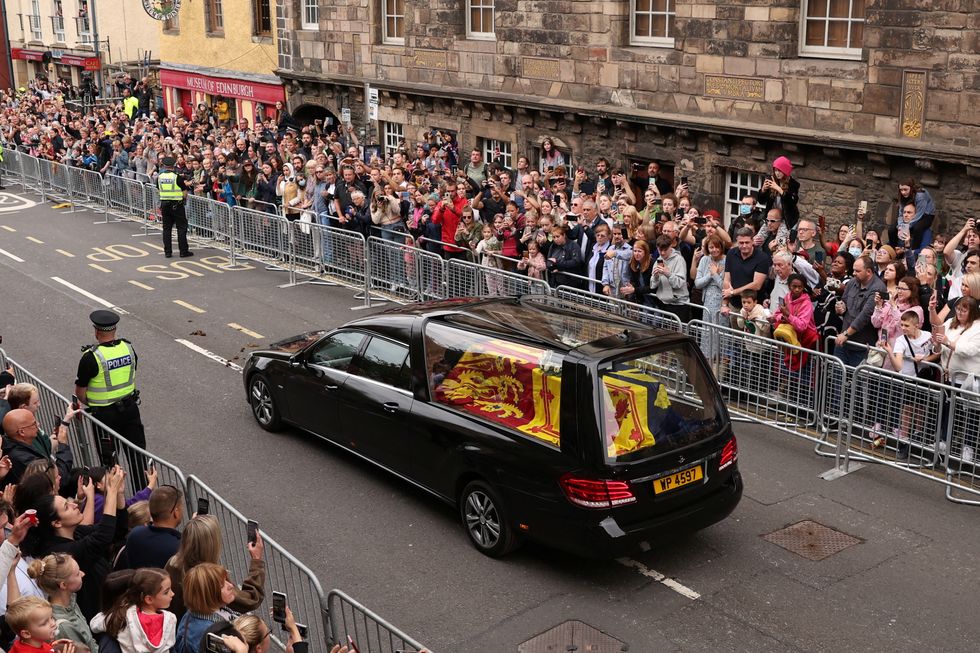 The Queen's coffin arrives on The Royal Mile in Edinburgh.