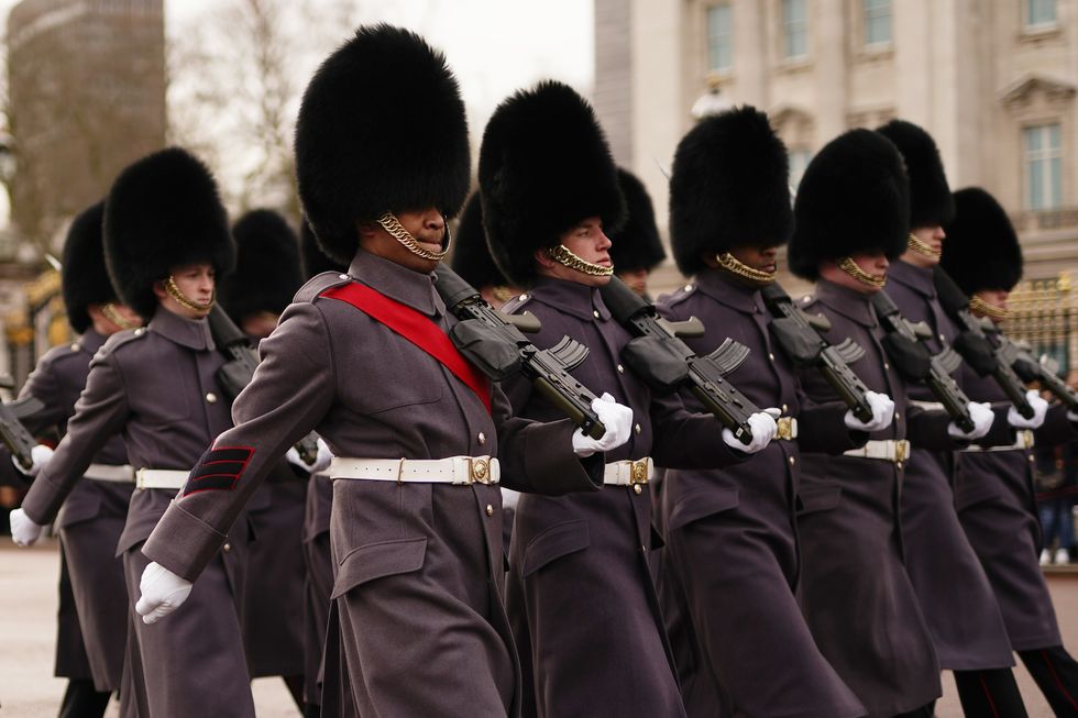 The Queen's Guard: F Company Scots Guards take part in the Changing of the Guard at Buckingham Palace, London, on the Platinum Jubilee of Queen Elizabeth II. Picture date: Sunday February 6, 2022.