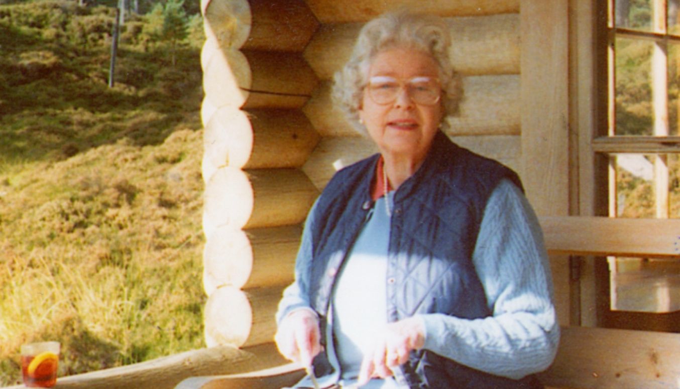 The Queen sitting at her Balmoral lodge in the same spot.