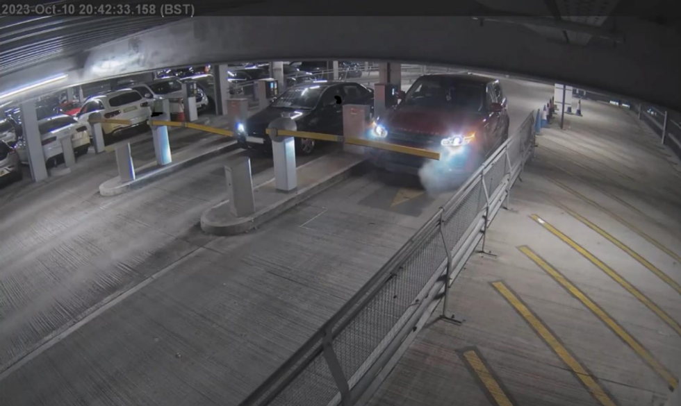 The Range Rover was seen smoking as it drove into London Luton Airport car park \u200b