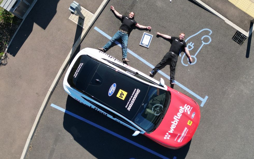 The record-breaking electric car (above, L-R Sam Clarke and Kevin Booker)