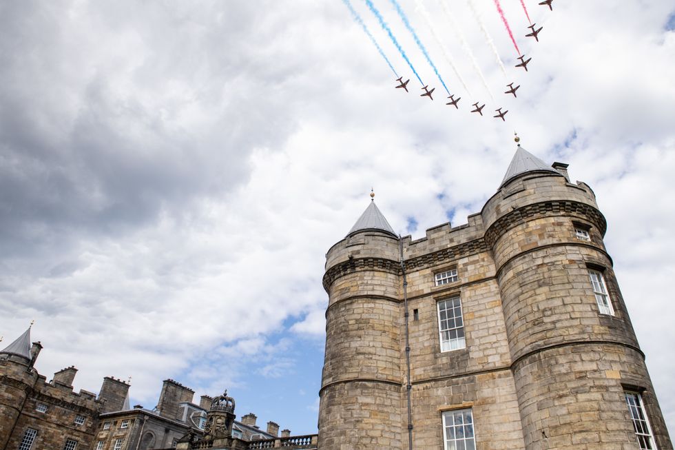The Red Arrows flypast the Palace of Holyroodhouse, Edinburgh
