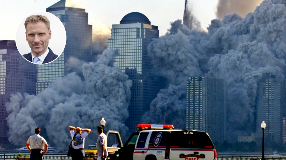 The remaining tower of World Trade Center, Tower 2, dissolves in a cloud of dust and debris about a half hour after the first twin tower collapsed, September 11, 2001