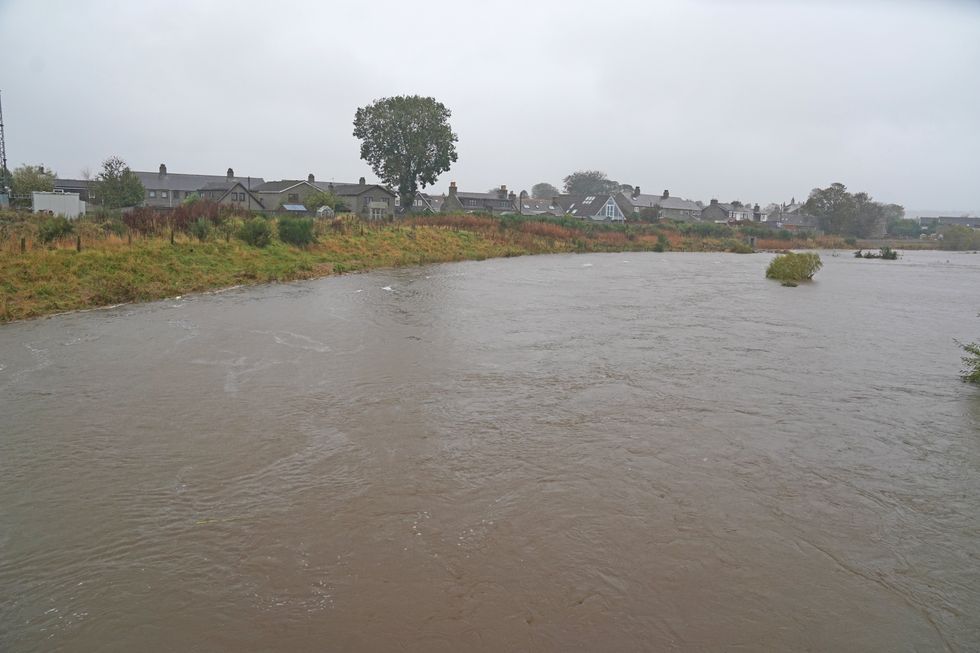 The River Don in Kintore as Storm Babet batters the country and a rare red weather warning is in place for parts of eastern Scotland all day on Saturday