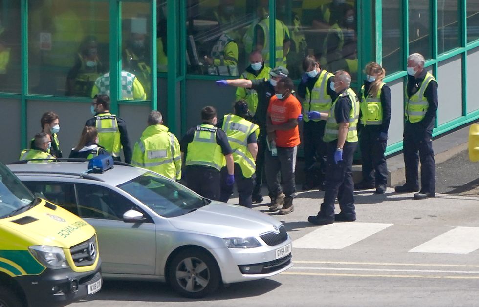 The scene at the Port of Dover in Kent, after eighteen migrants have been found on a ferry arriving in the UK, prompting a large emergency response