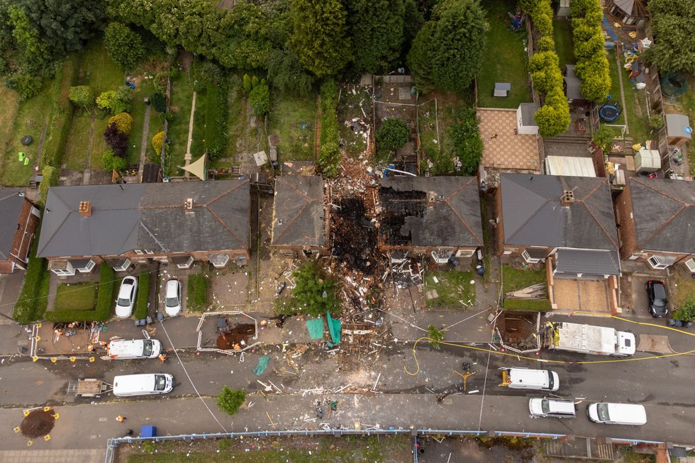 The scene in Dulwich Road, Kingstanding, Birmingham, where a man suffered life threatening injuries after an explosion destroyed a house on Sunday and caused damage to other properties and vehicles nearby. Picture date: Monday June 27, 2022.