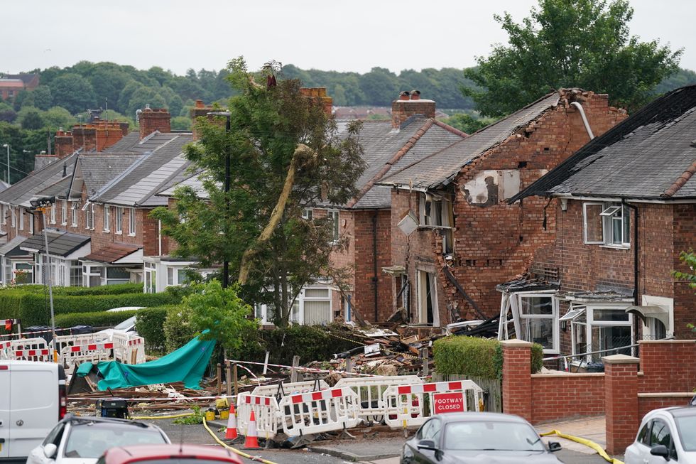 The scene in Dulwich Road, Kingstanding, where an explosion on Sunday destroyed a house and caused damage to other properties and vehicles nearby. Picture date: Monday June 27, 2022.