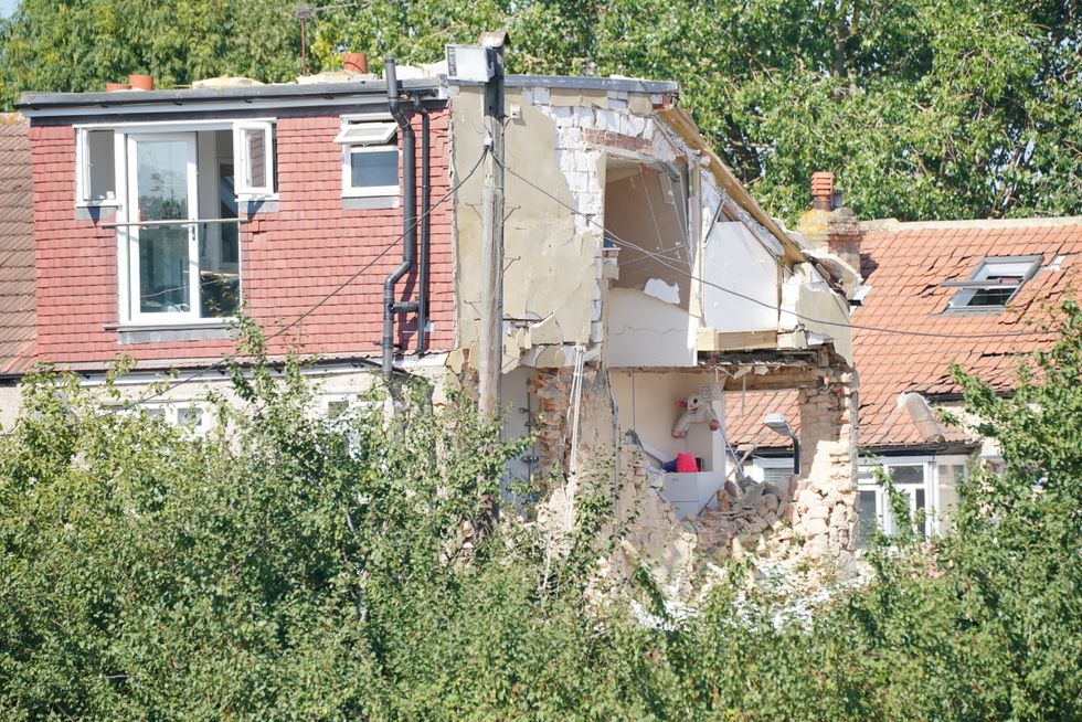 The scene in Galpin's Road in Thornton Heath, south London, where a house has collapsed amid a fire and explosion. Picture date: Monday August 8, 2022.