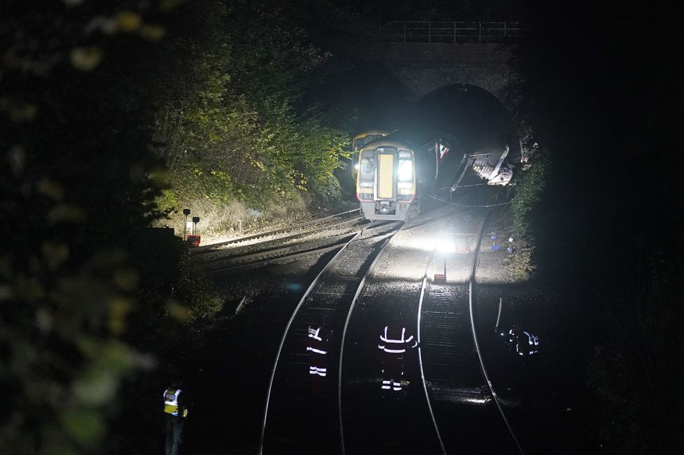The scene of a crash involving two trains near the Fisherton Tunnel between Andover and Salisbury in Wiltshire. Fifty firefighters are at the scene of the collision in which up to a dozen passengers are believed to have been injured. Picture date: Monday November 1, 2021.