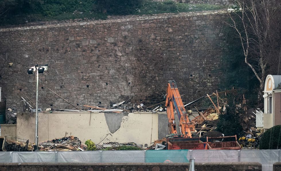 The scene of an explosion and fire at a block of flats in St Helier, Jersey. At least three people have died and a dozen are missing following the blast. Picture date: Sunday December 11, 2022.