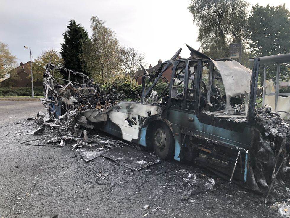 The scene on Abbott Drive in Newtownards near Belfast, after a bus was hijacked and set alight in an attack politicians have linked to loyalist opposition to Brexit's Northern Ireland Protocol. Picture date: Monday November 1, 2021.