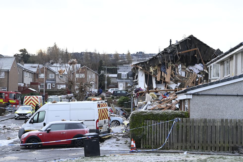 The scene on Baberton Mains Avenue, Edinburgh, after an 84-year-old man has died following an explosion at a house on Friday night