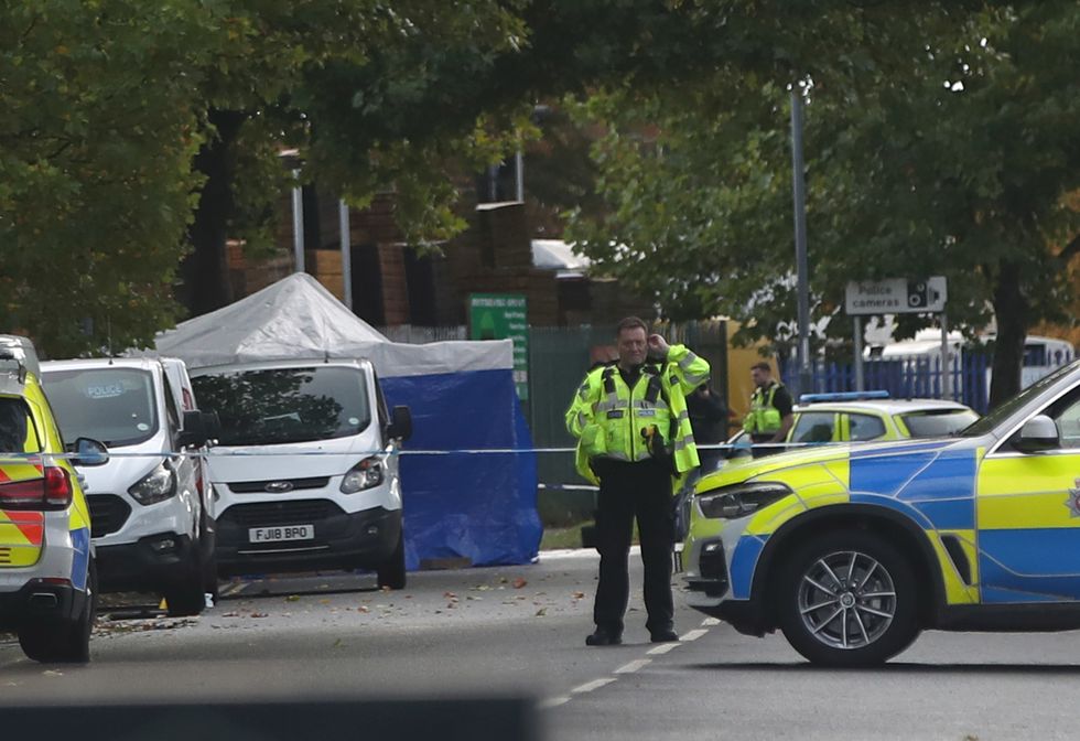 The scene outside Ascot Drive police station in Derby where a man was taken to hospital after being shot by armed officers. Picture date: Friday October 7, 2022.