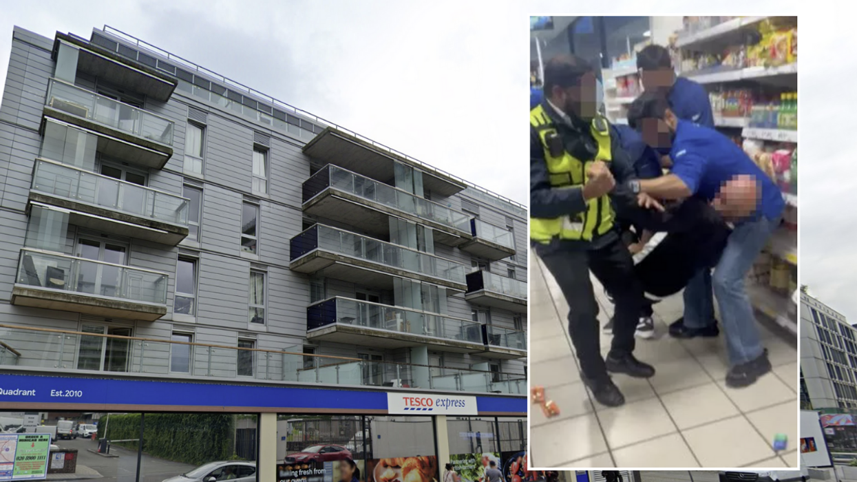 The shoplifter was hoisted off the ground by the shop workers