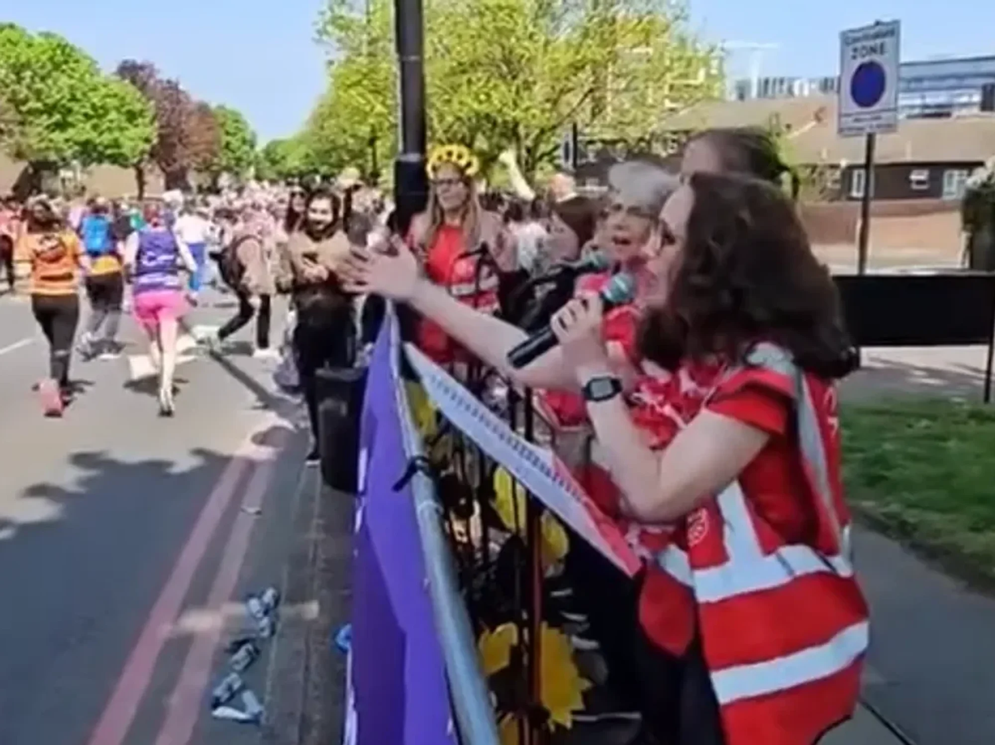 The Singing Striders performing at last year's London marathon for Scope