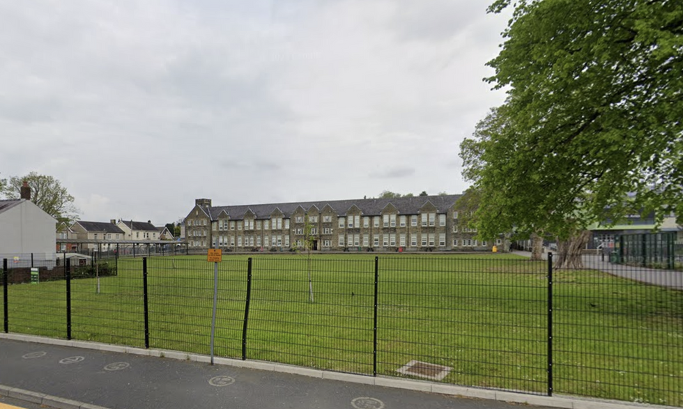 The south Wales school is reportedly on lockdown