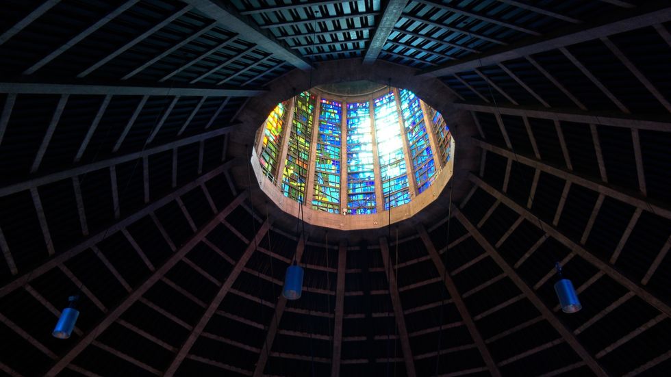 The Sun shining through the Cathedral\u2019s coloured glass \u2018lantern\u2019 in the roof