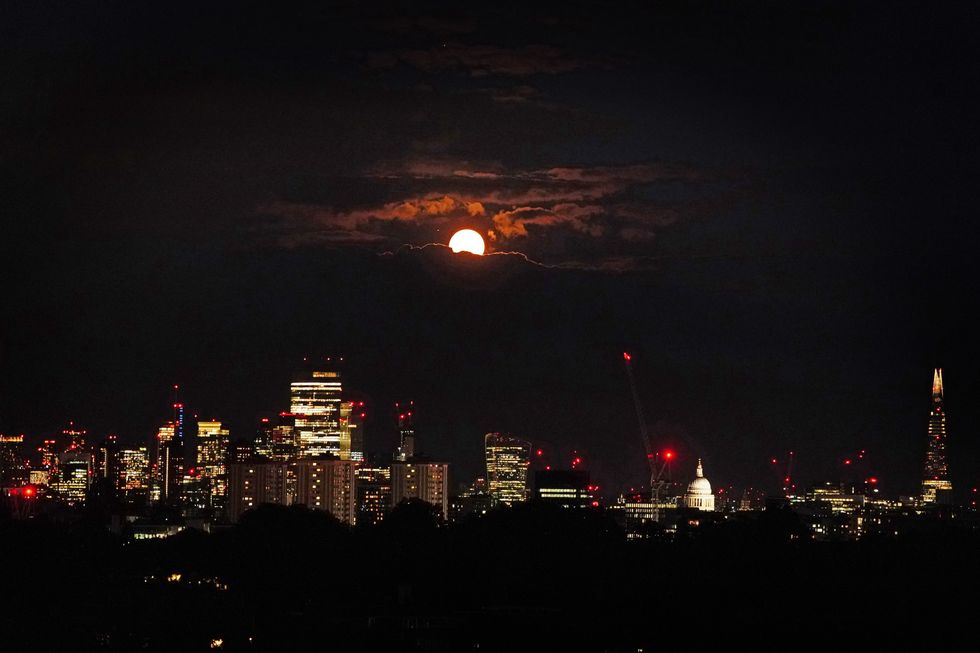 The super blue moon over the city of London seen from Primrose Hill