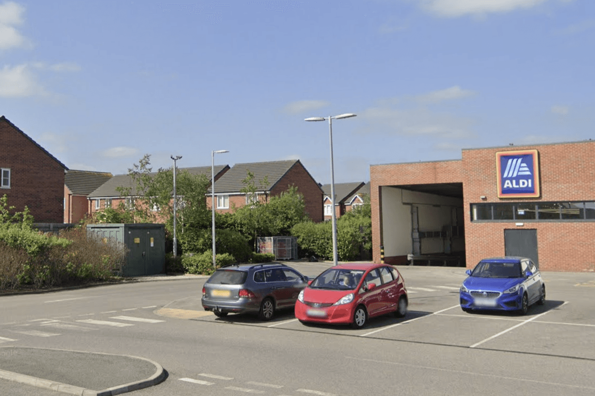 The supermarket is adjacent to a residential area