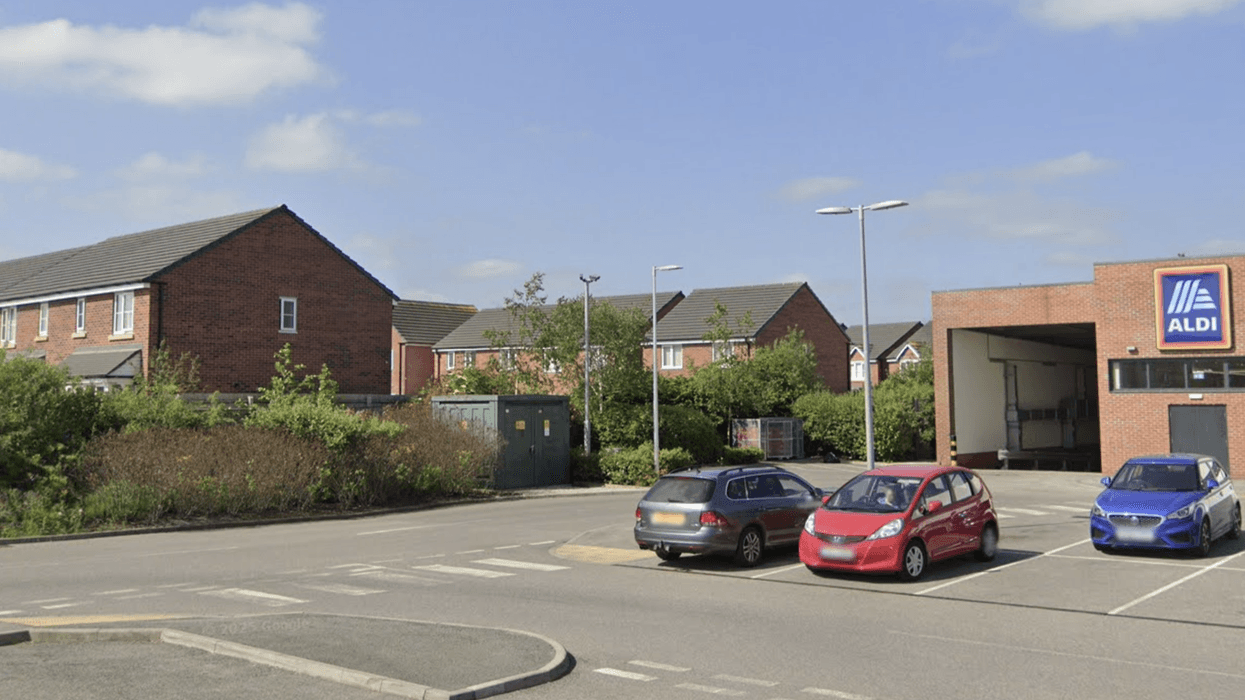 The supermarket is adjacent to a residential area