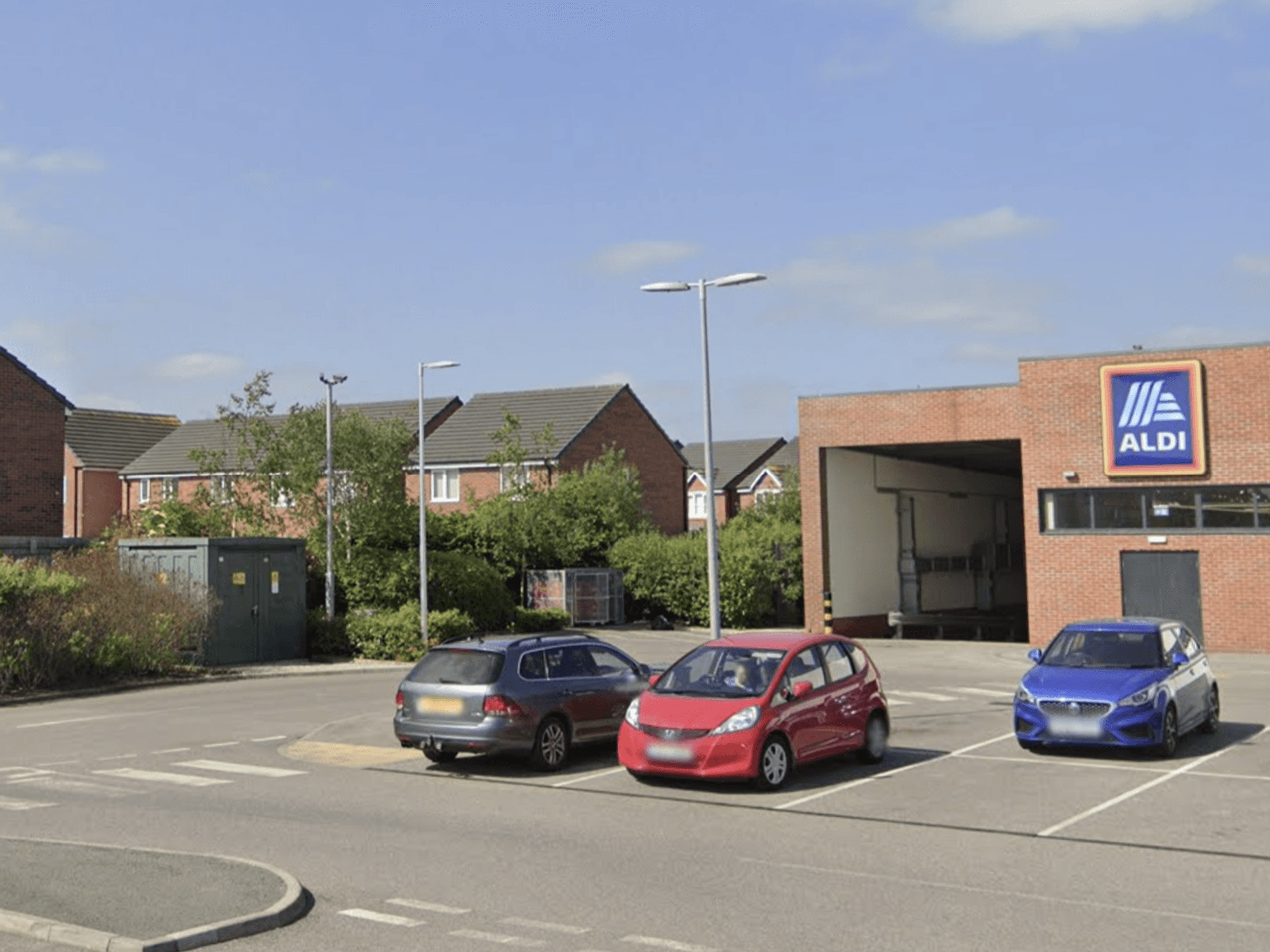 The supermarket is adjacent to a residential area