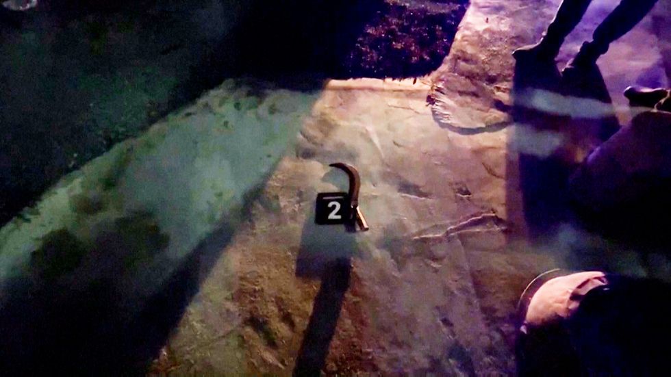 The suspected weapon, known as a rice sickle, found at the scene