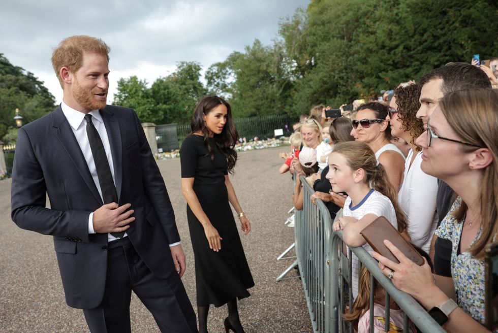The Sussexes speaking to members of the public outside Windsor Castle