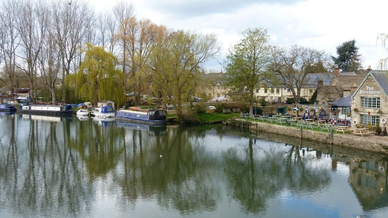 Boat engulfed in flames after 'explosion' on River Thames as nine people rushed to hospital