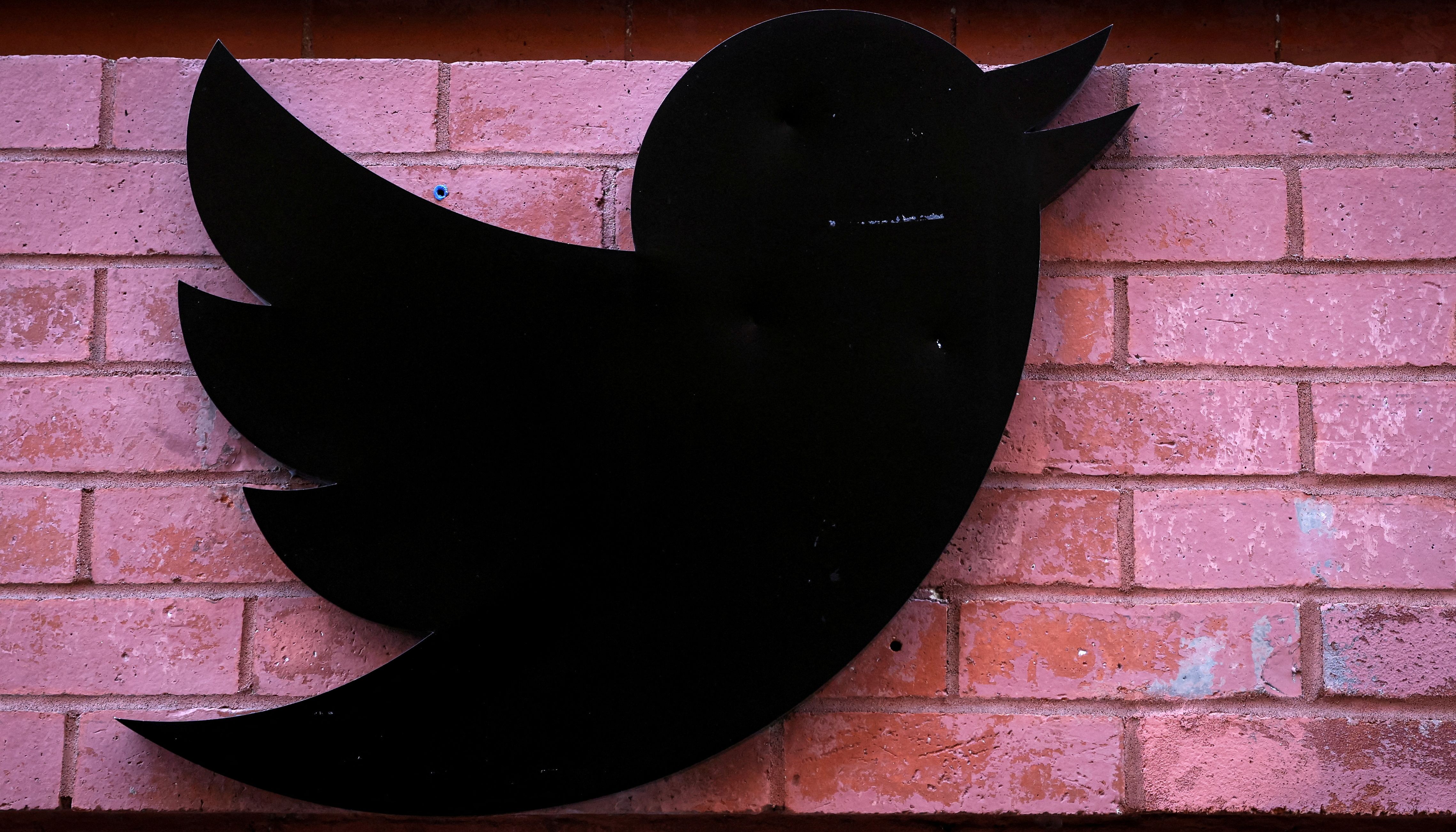 The Twitter logo is seen outside the offices in New York City, U.S