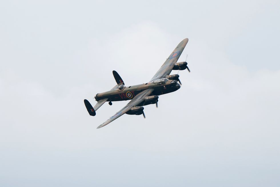 The UK's only airworthy Lancaster bomber, PA474, passes over Bracebridge Heath in Lincolnshire during the Royal Air Force Battle of Britain Memorial Flight flypast to commemorate the 80th anniversary of Operation Chastise