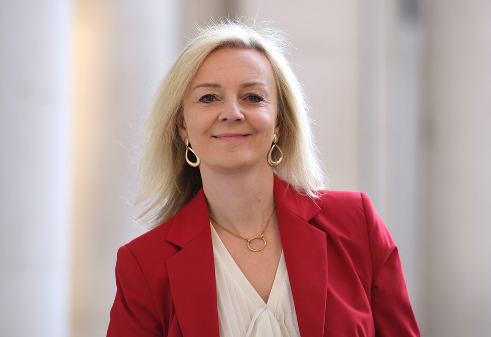 The UK will not “roll over” in the face of “unreasonable” threats from France, Foreign Secretary Liz Truss said.