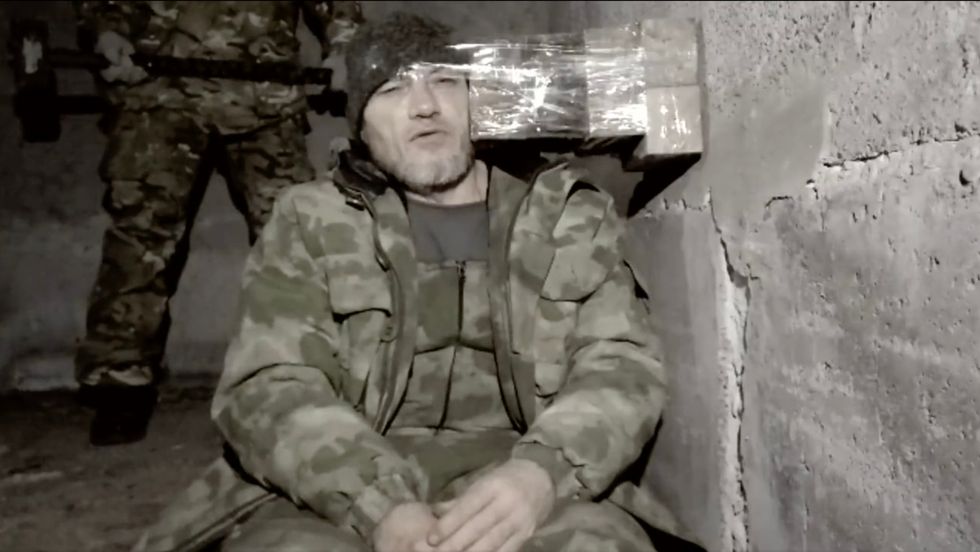 The video shows the brutal killing with a sledgehammer