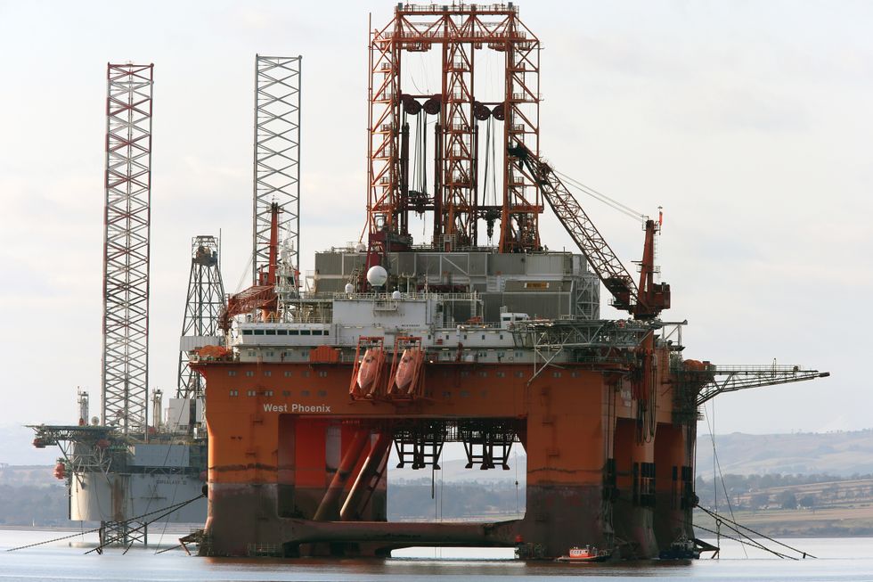 The West  Pheonix oil platform stands amongst other rigs which have been left in the Cromarty Firth near Invergordon in the Highlands of  Scotland. Rig platforms are being stacked up in the Cromarty Firth as oil prices continue to decline having a major impact on the UK's North Sea oil industry leaving thousands of people out of work.