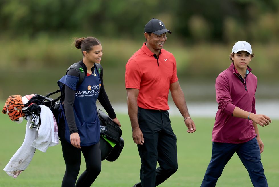 The Woods family have all been out on the course together