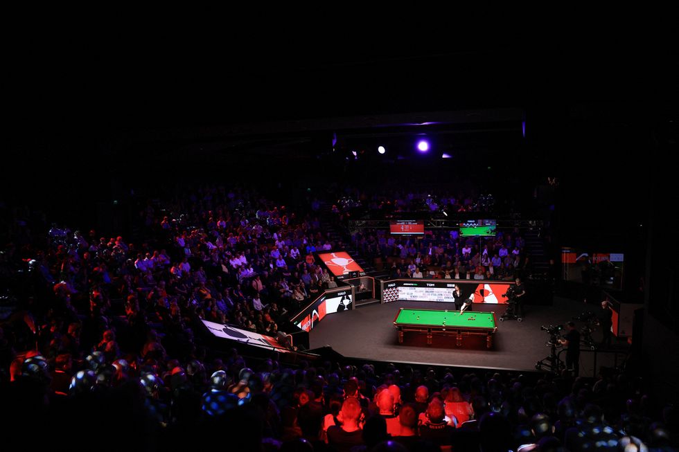 The World Snooker Championship final was halted after a medical emergency with players told to return to their chairs