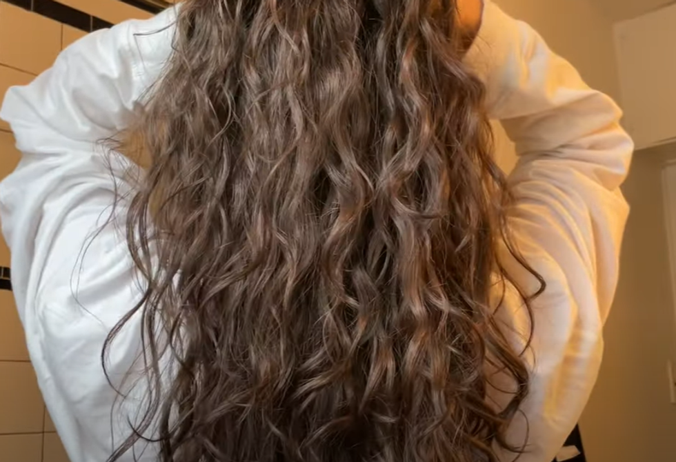 The YouTuber shows off her hair