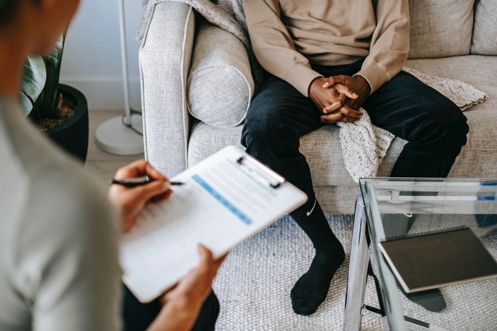 Therapist talking to a man