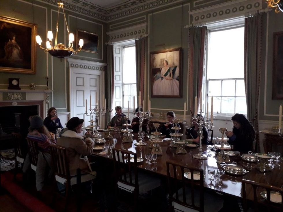 This is Rigged activists sat in the royal dining room