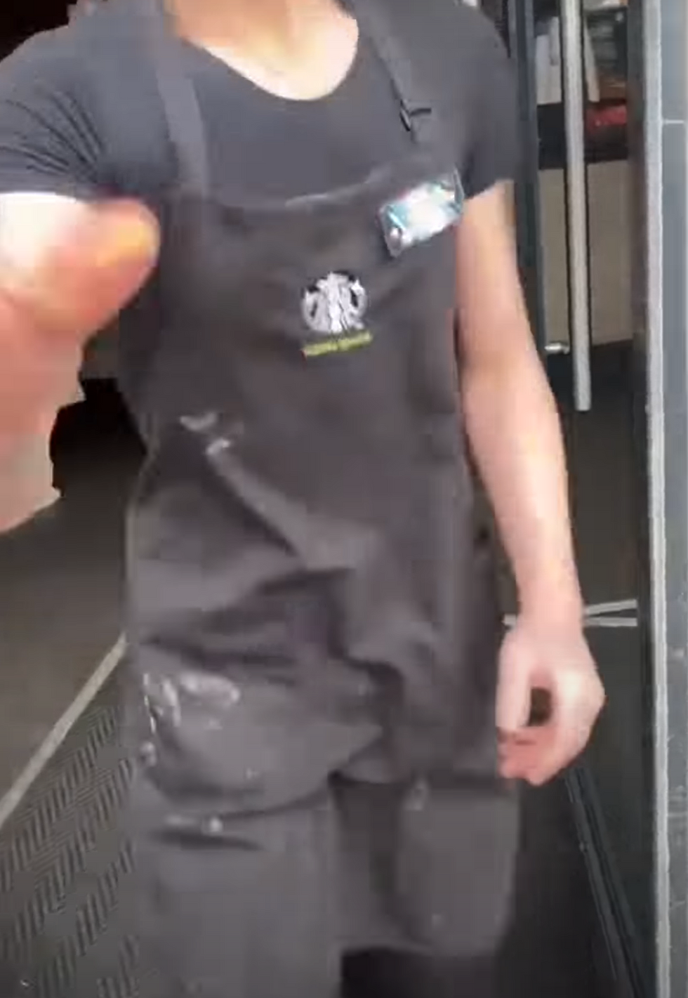 Thomas\u2019s partner Mark Andrews recorded the entire incident and Spain was seen trying to snatch his mobile phone from his hand