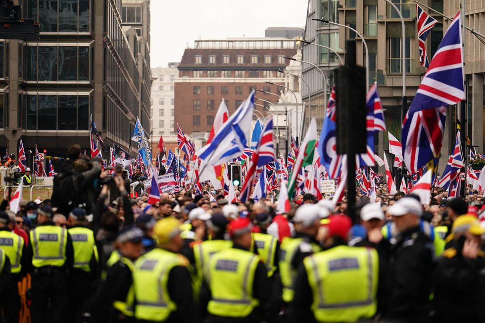 Thousands gather for Tommy Robinson inspired demonstration as counter-protesters descend on London